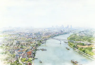 Aerial river city in soft mist, wide angle