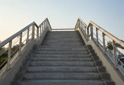 Old staircase at golden hour, wide angle