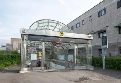 Metro entrance after rain, wide angle