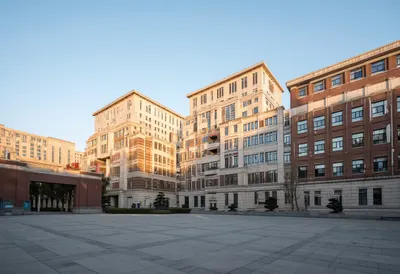 University quad at golden hour, wide angle