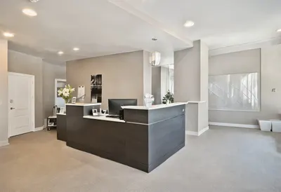 Reception desk in soft daylight, wide angle