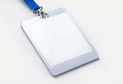 Conference badge in a minimal setting, low angle