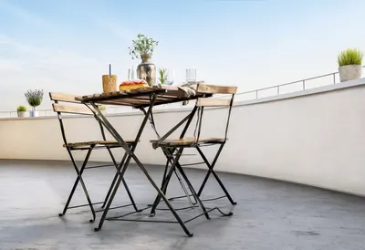 Rooftop table in a minimal setting, low angle