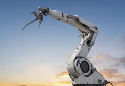Robot arm line at dusk, low angle