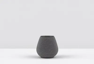 Smart speaker in a clean studio, low angle