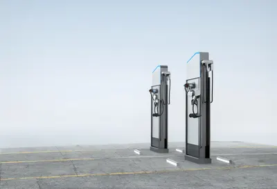 Ev charging plaza in a clean studio, low angle
