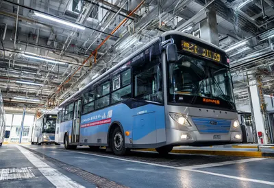 Electric bus depot in a lab setting, low angle