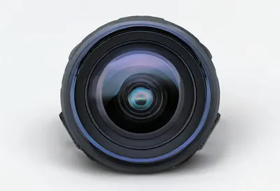 Camera lens macro in a clean studio, high angle